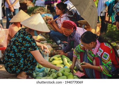 Bac ha, Vietnam - July 7, 2019 : Selective focus on Vietnamese buying vegetables at  Bac Ha market, Bac Ha is hill tribe market  in northern Vietnam