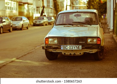 Bacau, Romania - 10.06.2019: Old And Damaged Dacia Romanian Car On The Street