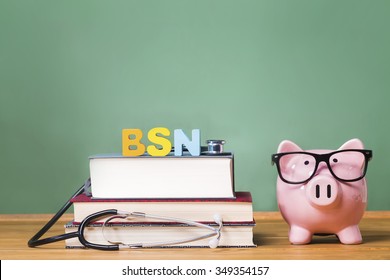 Bachelor Of Science In Nursing BSN Theme With Pink Piggy Bank With Chalkboard In The Background As Concept Image Of The Costs Of Education