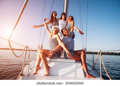 Bachelorette Party And Vacation Concept .Girls Waving On Boat Or Yacht