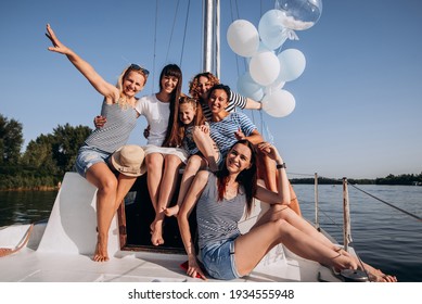 Bachelorette Party And Vacation Concept .Girls Waving On Boat Or Yacht