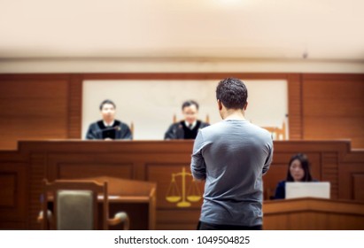 back of attastor talking to magistrate in court. the law adjustment concept - Shutterstock ID 1049504825
