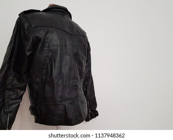 Back Of Black Leather Punk Jacket Hanging