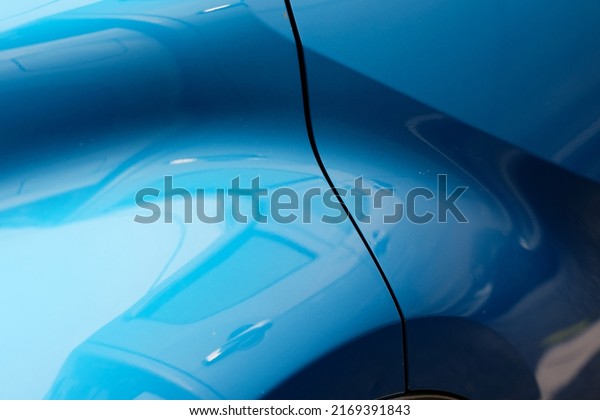 the back of the blue\
car