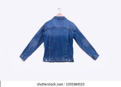 Back Of Blue Jeans Jacket Isolated On Hanging
