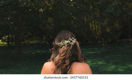 Back of a bridesmaid at a wedding - Powered by Shutterstock