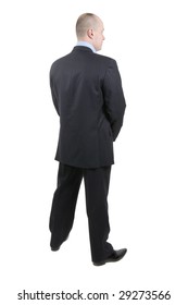 Back Of Businessman In Suit. He Is Standing Like A Bodyguard.