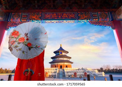 Back Of A Chinese Woman In A Traditional Winter Dress At The Hall Of Prayer For Good Harvests (a Translation From The Blue Name Plate) At The Temple Of Heaven In Beijing, China