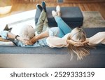 Back, couple and relax on sofa in home for peace, calm or stress relief together in living room. Mature man, woman and rest on couch for comfort, leisure and people chill or dream on weekend at hotel