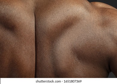 Back. Detailed texture of human skin. Close up shot of young african-american male body. Skincare, bodycare, healthcare, hygiene and medicine concept. Looks beauty and well-kept. Dermatology. - Shutterstock ID 1651807369