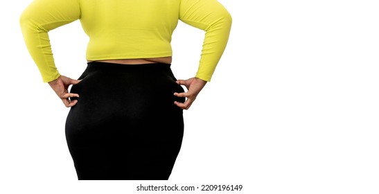 The Back Of A Fat Woman Using Hands To Pinch On The Hips Which Is Large And Full Of Excess Fat On White Isolated Background, To Fat Woman And Health Care Concept.