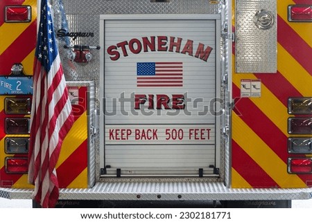 Back of fire truck with American flag