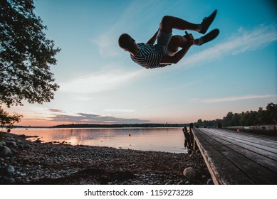 Back Flip On The Beach Sunset