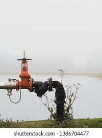 Back flow prevention pipes on foggy day