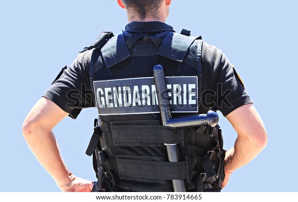 back of french\
policeman