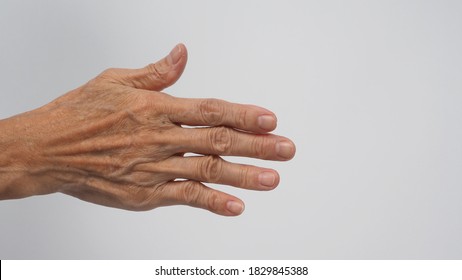 Back Hand With Wrinkle Skin Of Senior Or Older Woman On White Background.