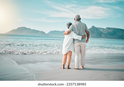 Back, hug or old couple on beach to relax with love, care or support on summer vacation in nature. Retirement, mature man or senior woman at sea or ocean to travel on holiday together looking at view - Powered by Shutterstock