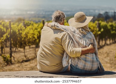 Back, hug and romance with couple in vineyard together for outdoor bonding, love or wellness. Countryside, nature or view with man and woman embracing on wine farm for anniversary, date or honeymoon - Powered by Shutterstock