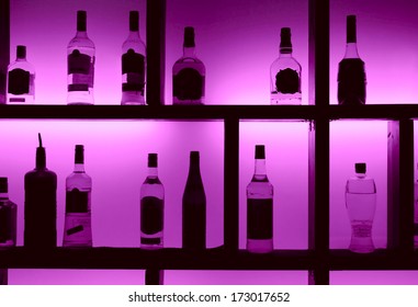 Back lit bottles in a cocktail bar