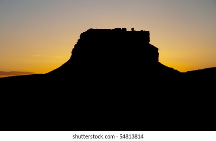 Back Lit Fajada Butte At Sunrise