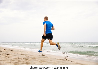 Back Male Runner Athlete Run On Sandy Beach