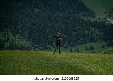 Back Male Runner Run Trail During Ultramarathon