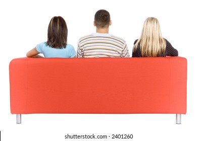 Back Of Man And Two Women Sitting On A Red Couch.  Isolated On White Background, In Studio.