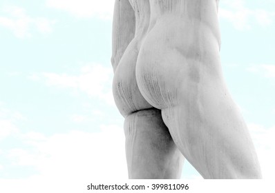 Back Of The Marble Statue With Muscular Legs And White Buttocks