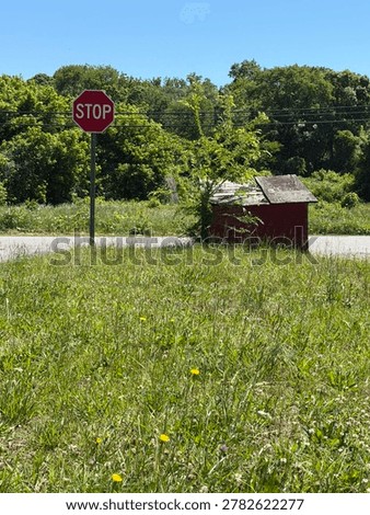 Back of an old red shack, or hydrant house