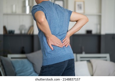 Back Pain, Kidney Inflammation, Man Suffering From Backache At Home, Health Problems Concept