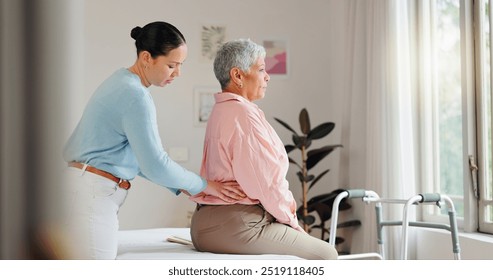 Back pain, physiotherapy and mature woman for medical service, consulting and wellness. Healthcare, chiropractor and physical therapist with senior patient for rehabilitation, recovery and mobility - Powered by Shutterstock