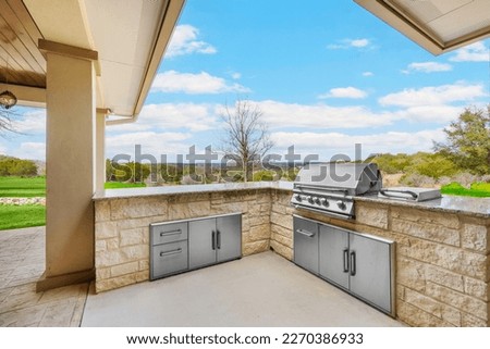 A back patio with a grill