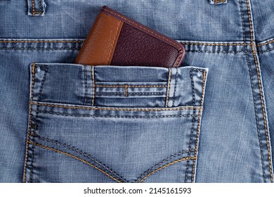 Back Pocket Of Jeans With Protruding Wallet, Concept Of Safety Of Savings Or Cash Storage.