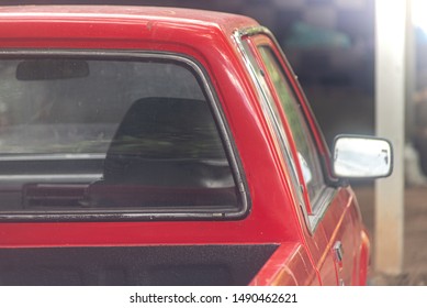 The Back Of A Red Pickup Truck