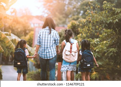 6,513 Mom walking kid backpack Images, Stock Photos & Vectors ...