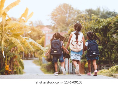 Back To School. Asian  Pupil Kids With Backpack Going To School Together In Vintage Color Tone