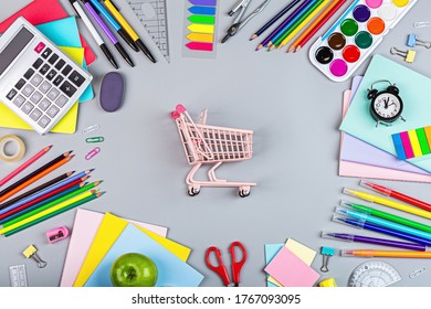 Back To School Background With Grocery Cart. Collection Of School Supplies In A Bright Flat Style. Educational Concept. Copy Space, Mockup, Overhead, Template.