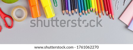 Back to School background with place for text. Collection of school supplies in a bright flat style. Educational concept. Copy space, mockup, overhead, template.