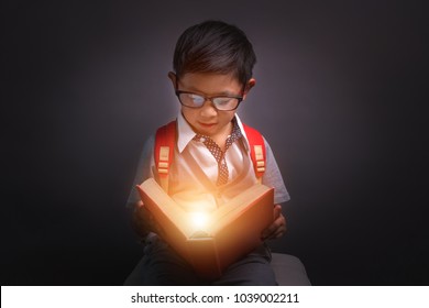 Back To School, Child Opened A Magic Book, Image Dark Tone