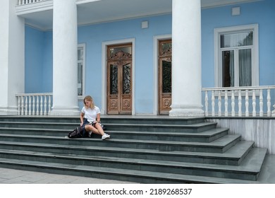 Back To School. Back To College,Girl Student Near College,university With Laptop.Education In College,Meeting Students.Beginning Of School Year At University National Day Of Knowledge