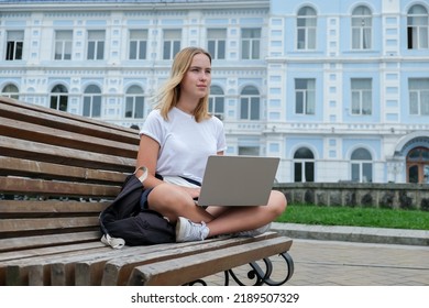 Back To School. Back To College,Girl Student Near College,university With Laptop.Education In College,Meeting Students.Beginning Of School Year At University National Day Of Knowledge