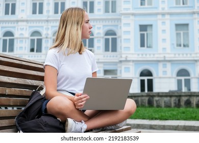 Back To School. Back To College,Girl Student Near College,university With Laptop.Education In College,Meeting Students.Beginning Of School Year At University National Day Of Knowledge