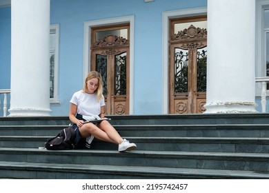 Back To School. Back To College,Girl Student Near College,university With Laptop.Education In College,Meeting Students.Beginning Of School Year At University National Day Of Knowledge