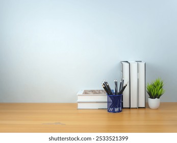 Back to school concept,  Book stack and  Pencil on wooden table workspace area and white wall, Concept of time to study, Read books, Concept of preparing for exams.