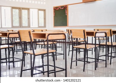 Back To School Concept. School Empty Classroom, Lecture Room With Desks And Chairs Iron Wood For Studying Lessons In Highschool Thailand Without Young Student, Interior Of Secondary Education 