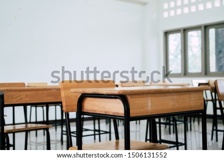 Back to school concept. School empty classroom, Lecture room with desks and chairs iron wood for studying lessons in highschool thailand without young student, interior of secondary education 