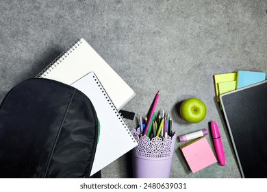 Back to school concept - school office supplies and apple fruit - Powered by Shutterstock