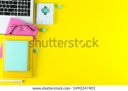 Back to school concept. Set of different school supplies, notebook, pen, accessories and laptop on textured background. Various scolorful stationery items. Close up, copy space, top view, flat lay.