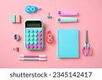 Back to school concept. School supplies on pastel pink background. Flat lay, top view calculator, paper notebook, scissors, pens, sharpeners, erasers, markers