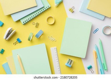 Back To School Concept. Top View Photo Of Colorful Diaries Sharpener Ruler Pens Binder Clips Adhesive Tape And Mini Stapler On Bicolor Yellow And White Background